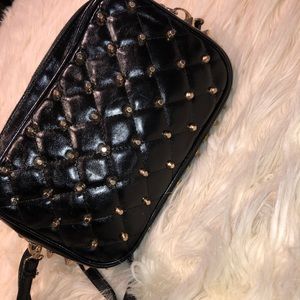 Black spiked cross body bag